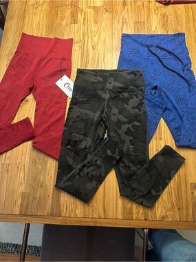 ZYIA bundle of 3 Leggings Red Black and Olive Print
